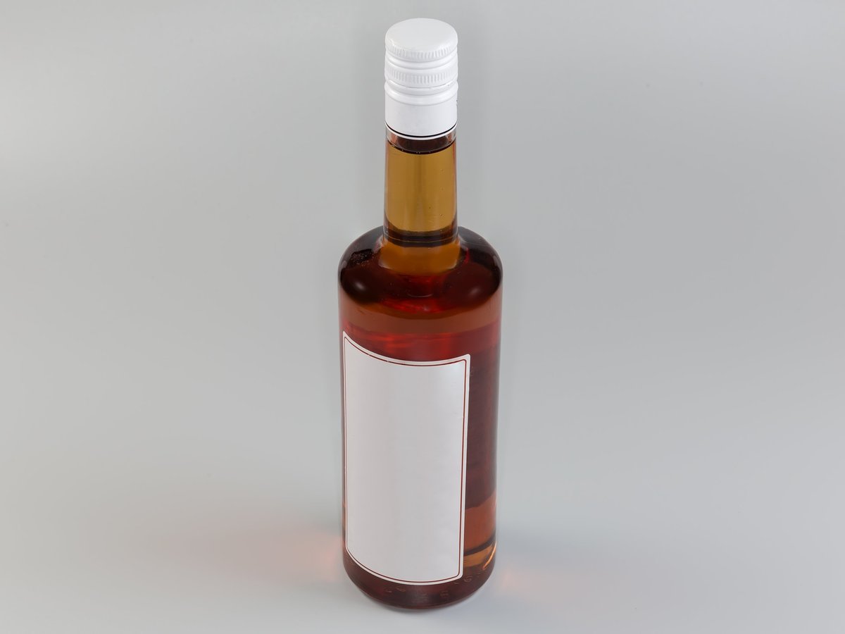 Placeholder product photo — unlabeled glass bottle of maple syrup, ready for the seller's own image